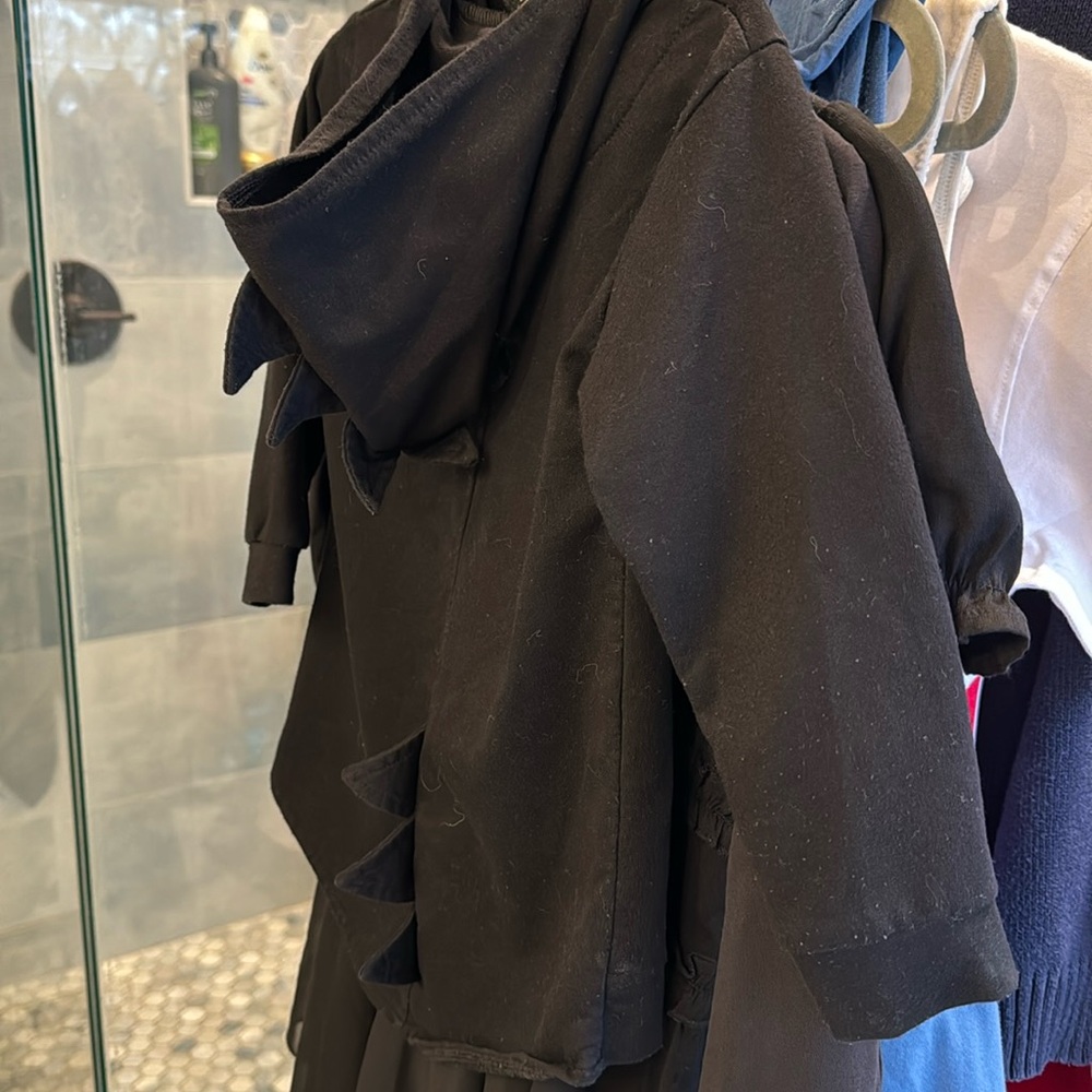 Black Dino themed zip up sweatshirt.  Size 2T-4T